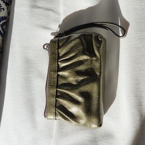 Coach patent leather wrislet in greenish dark gray